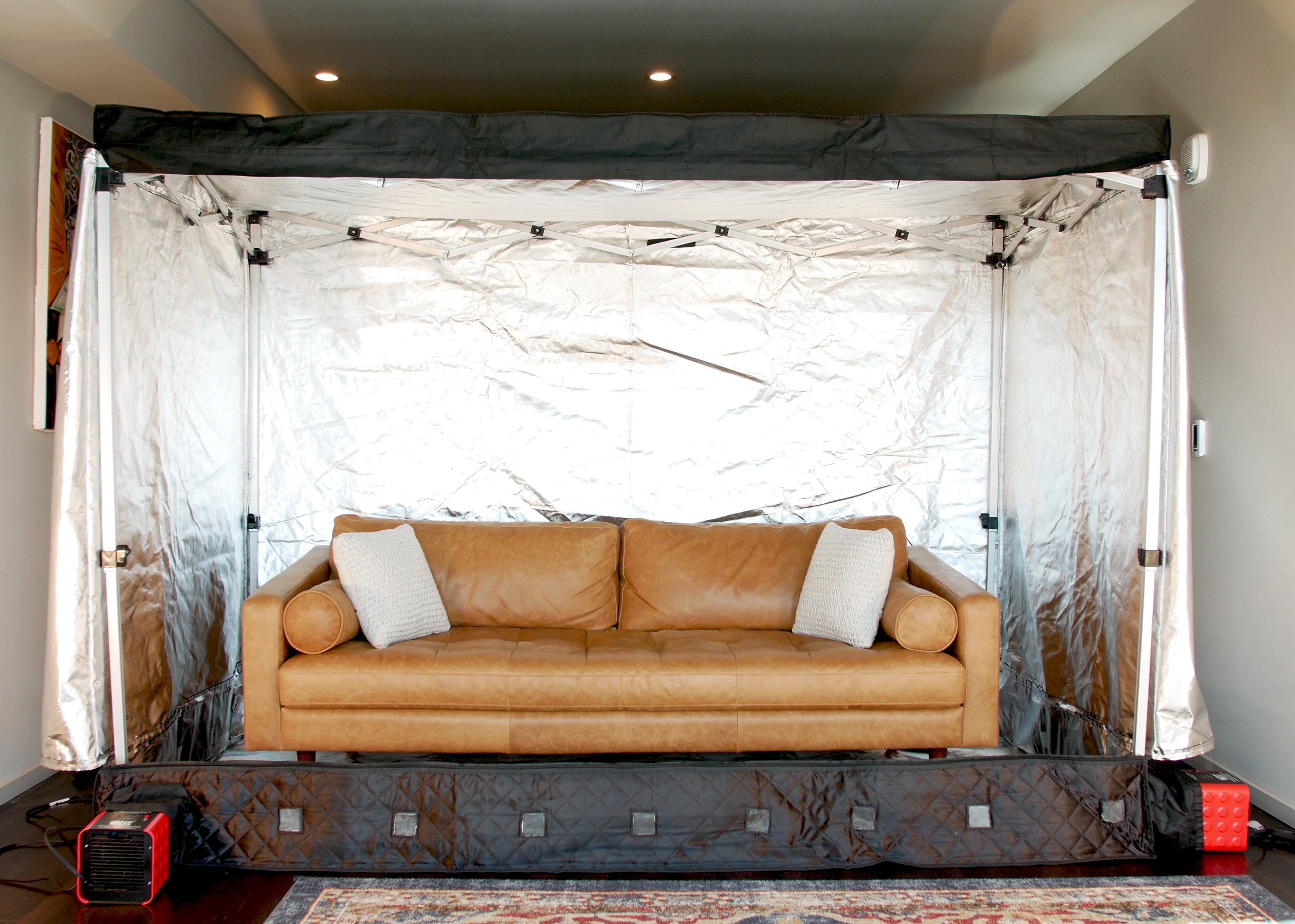 ZappBug Room in a living room half open displaying a cloth couch being treated
